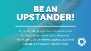 hands gripping each other, text reads: an upstander is a person who intervenes to support someone being harassed, intimidated, discriminated against, attacked, bullied, or otherwise dehumaized.